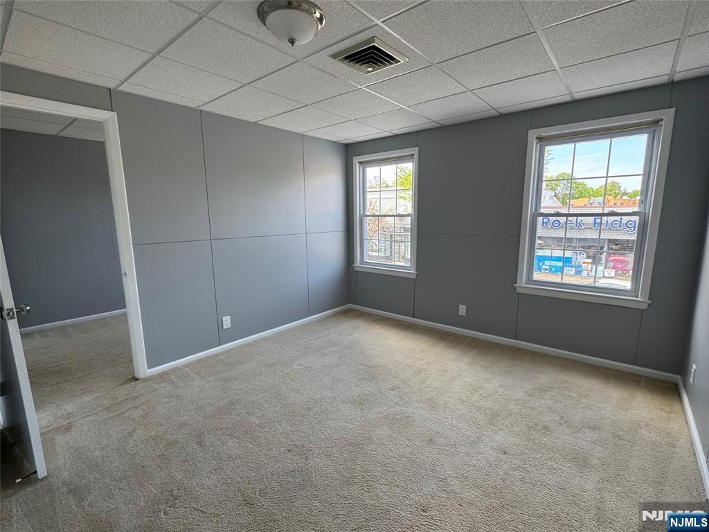 196-rock Rock Road, Unit 2A Glen Rock, NJ 07452 - Photo 10 of 26 an empty room with windows