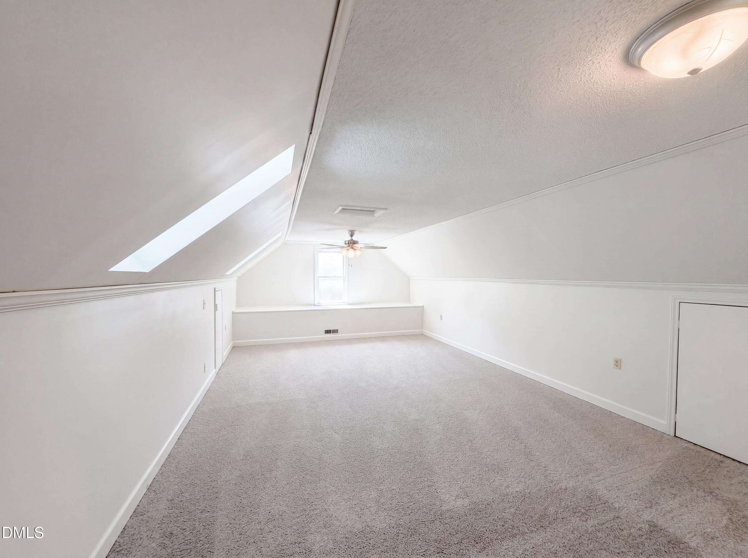 3921 Iron Horse Road Raleigh, NC 27616 - Photo 13 of 20 a view of a big room with closet and windows