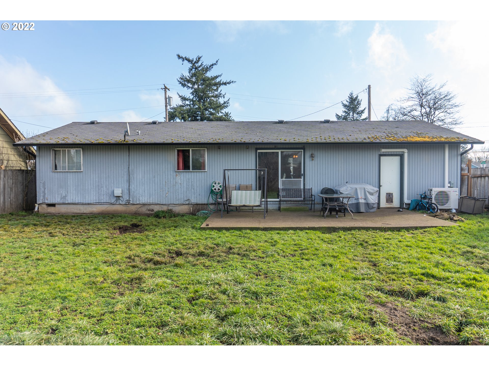 242 South 44th Street Springfield, OR 97478 - Photo 20 of 22 a view of a house with pool and chairs