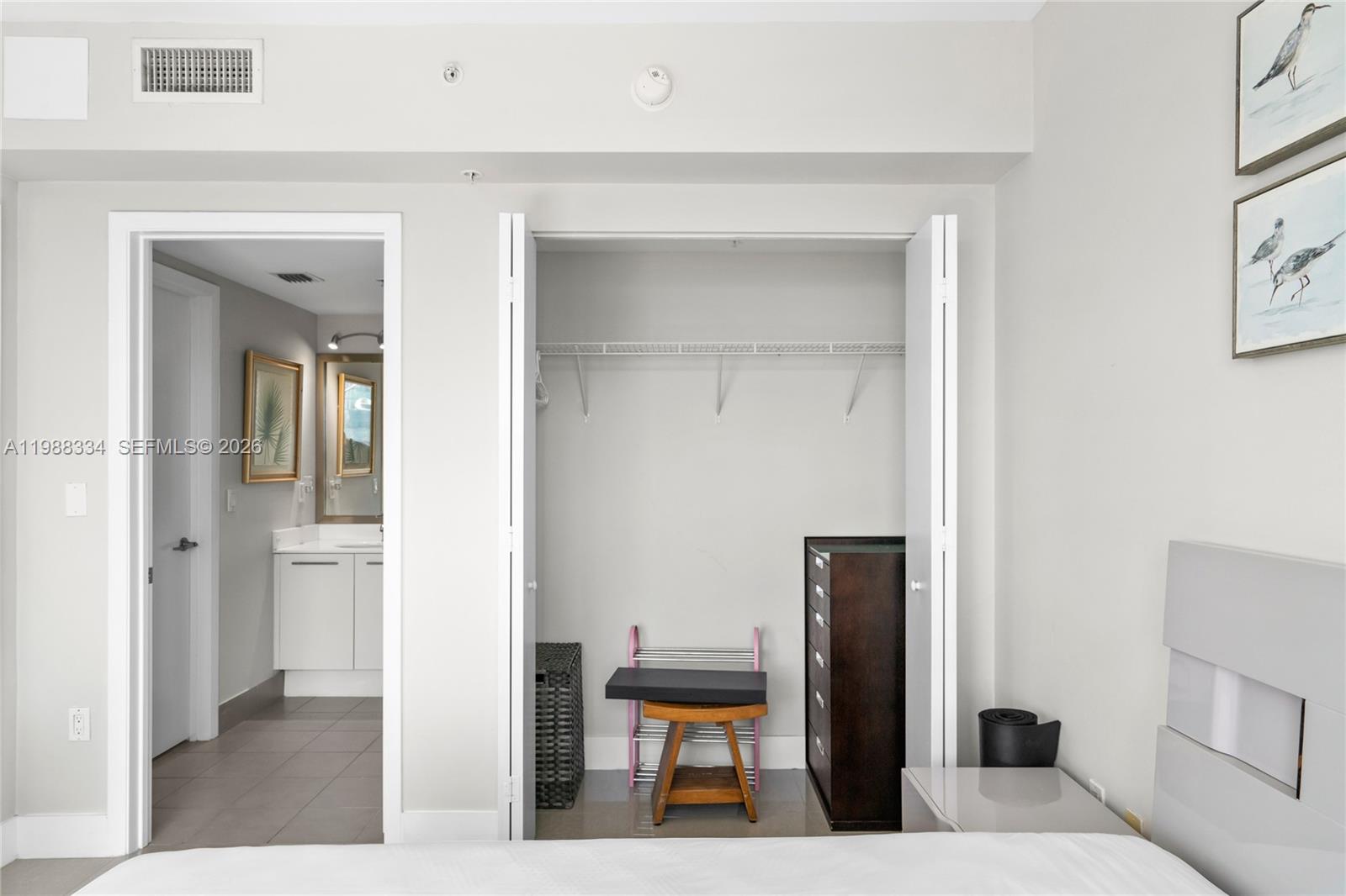 92 Southwest 3rd Street, Unit 4702 Miami, FL 33130 - Photo 27 of 47 a living room with furniture and a mirror