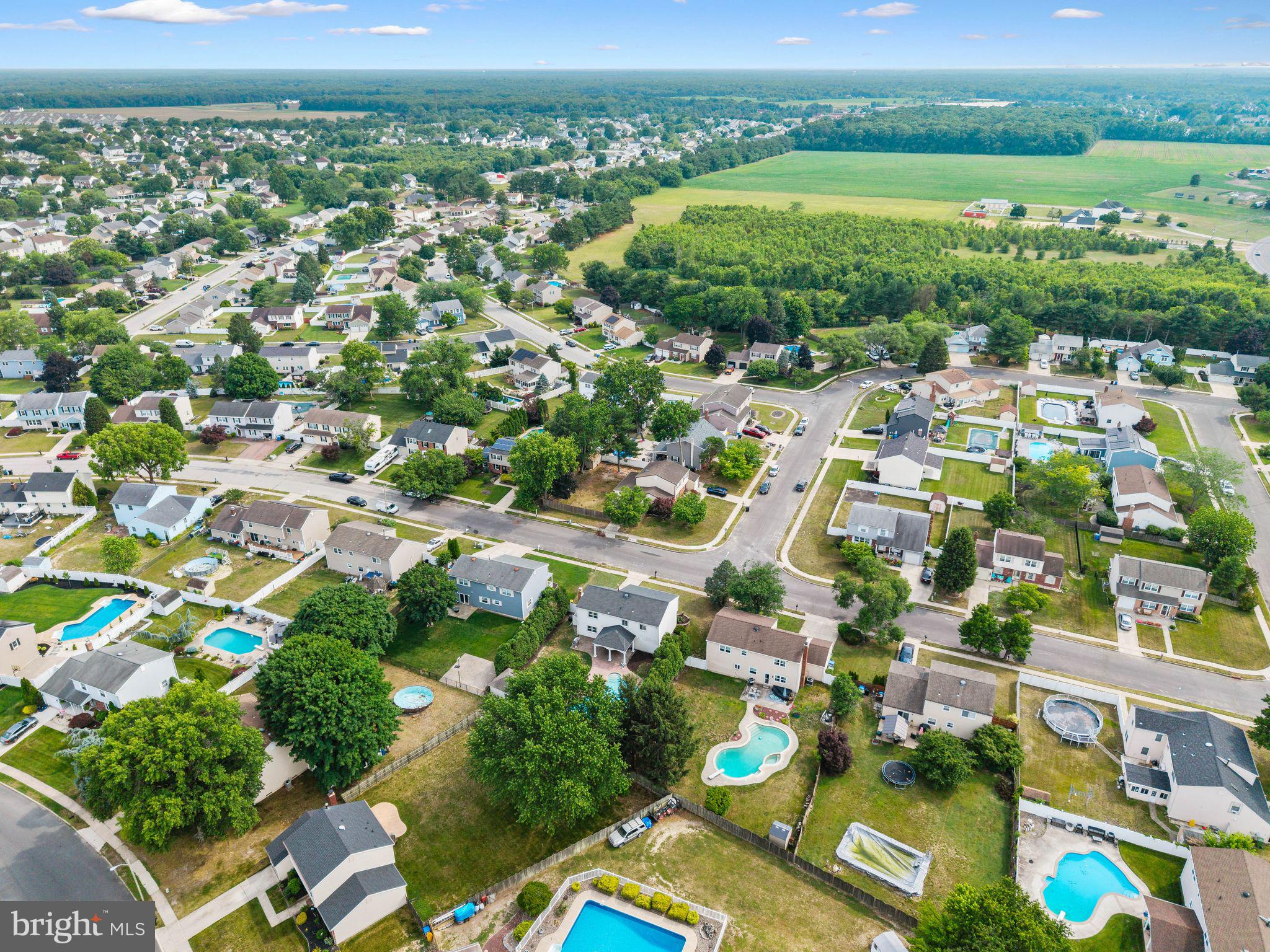 8 Chesterfield Road Sewell, NJ 08080 - Photo 52 of 57 an aerial view of residential houses with outdoor space and swimming pool