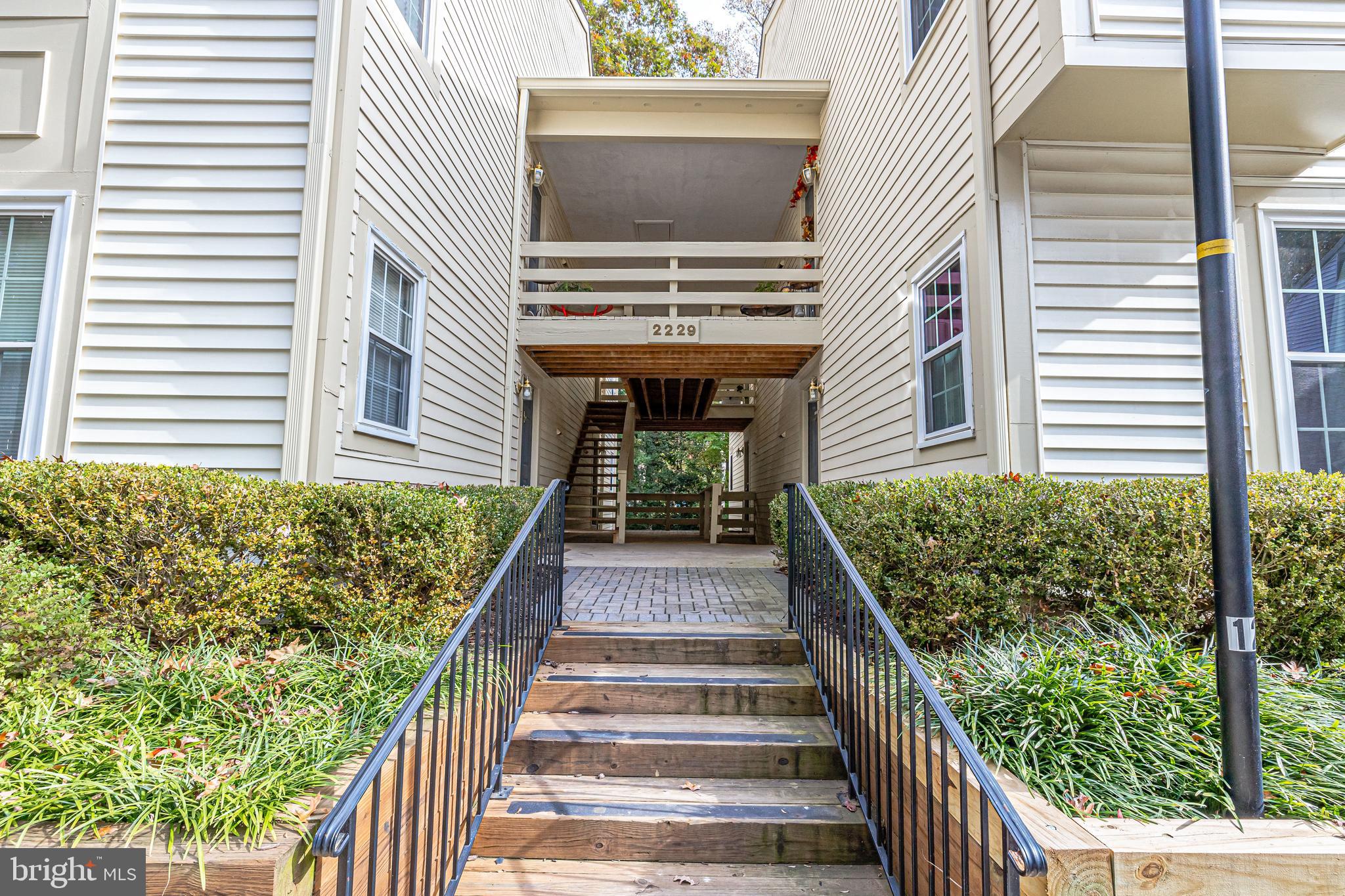 2229 Lovedale Lane, Unit G Reston, VA 20191 - Photo 2 of 38 a view of a balcony with chairs