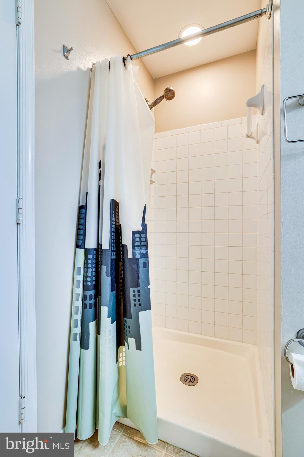 2229 Lovedale Lane, Unit G Reston, VA 20191 - Photo 26 of 38 a bathroom with a shower