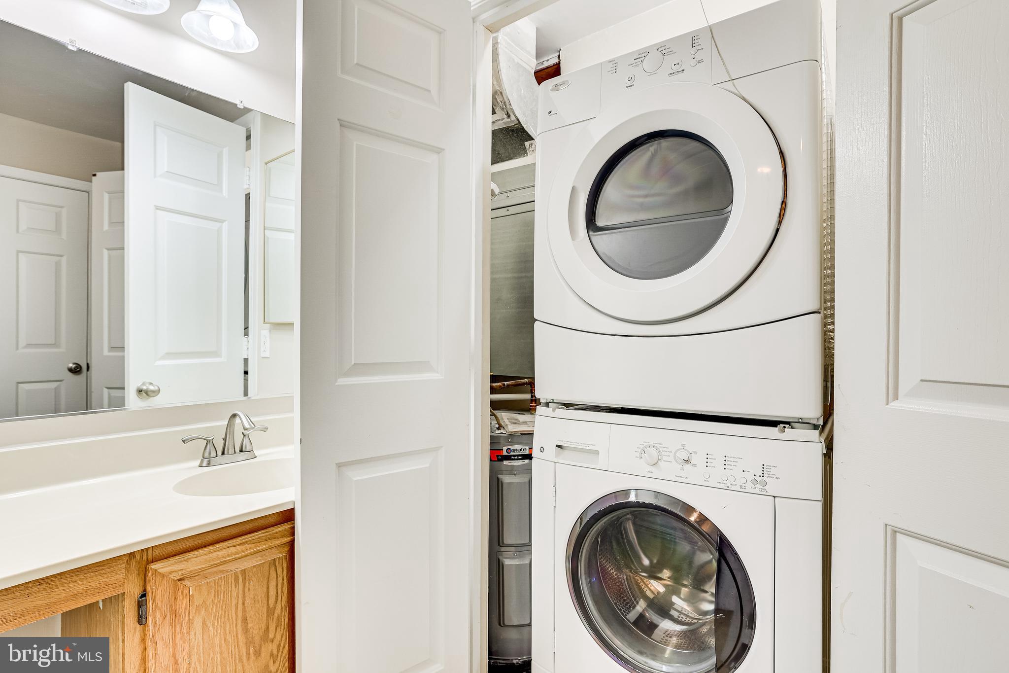2229 Lovedale Lane, Unit G Reston, VA 20191 - Photo 27 of 38 a utility room with dryer and washer