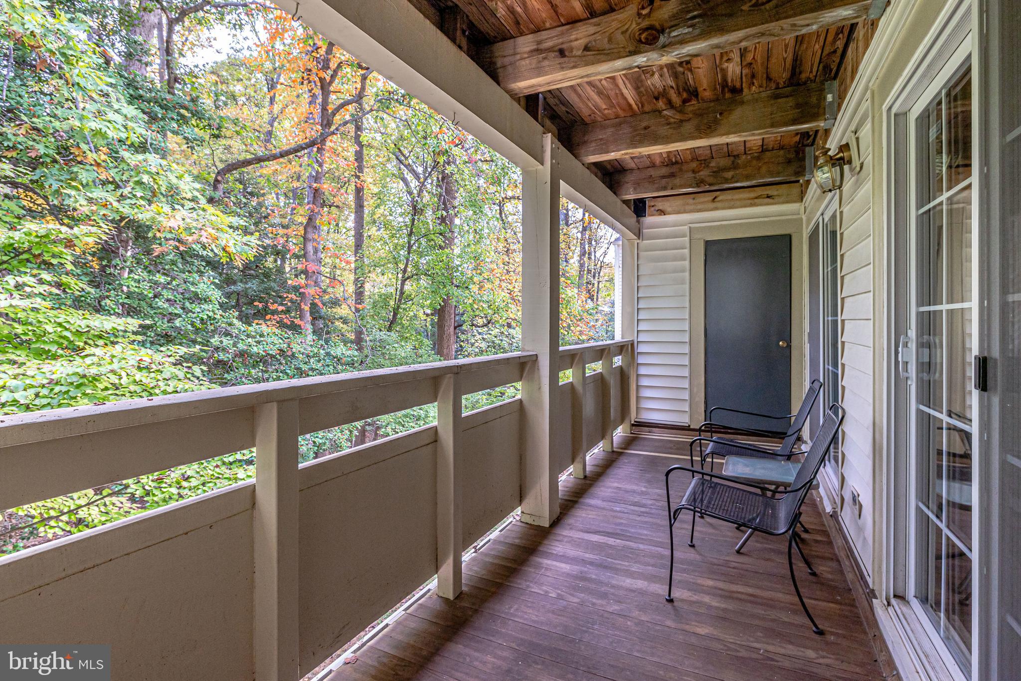 2229 Lovedale Lane, Unit G Reston, VA 20191 - Photo 30 of 38 a view of a balcony with wooden floor