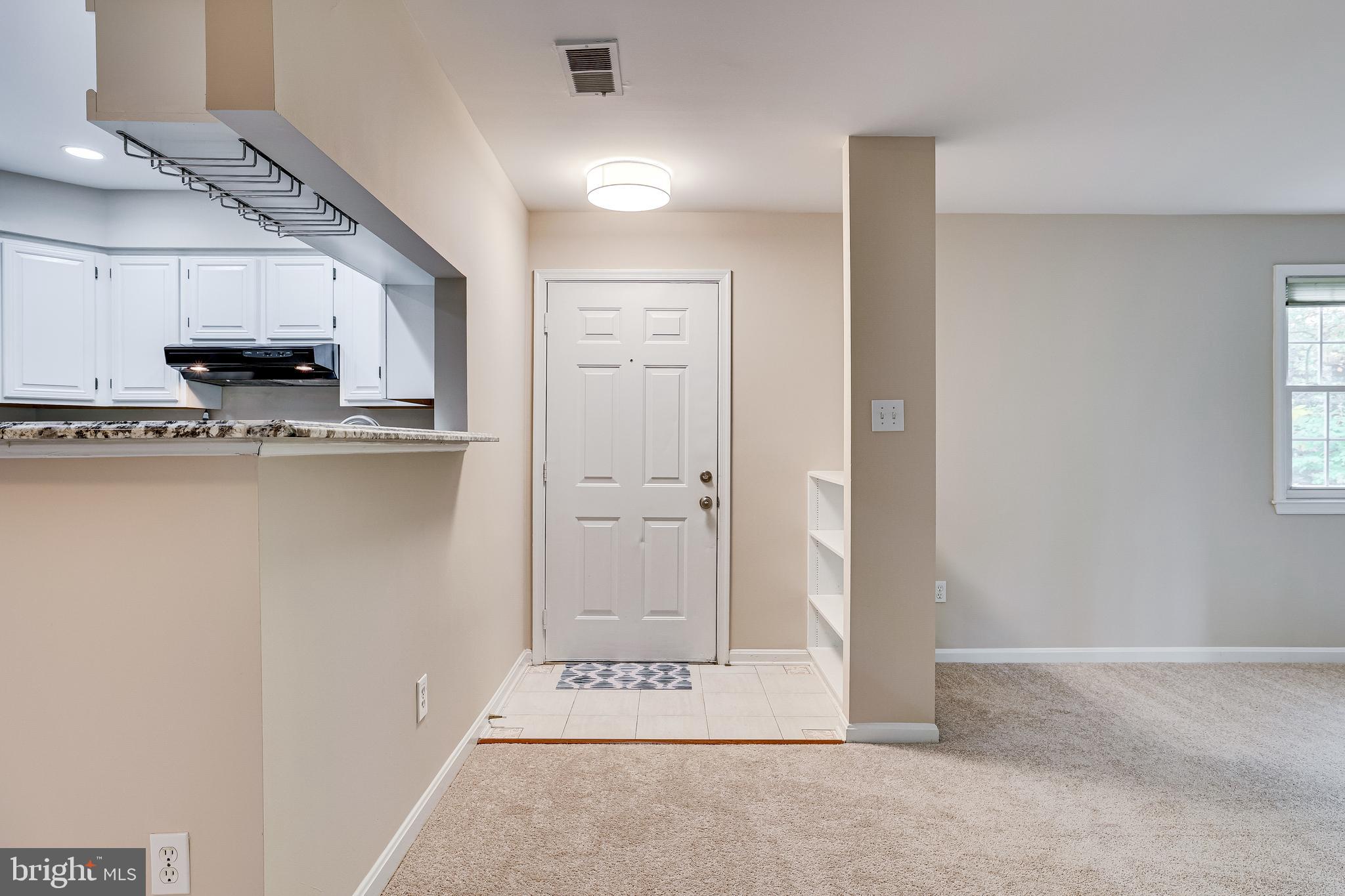 2229 Lovedale Lane, Unit G Reston, VA 20191 - Photo 4 of 38 a view of kitchen with stainless steel appliances a refrigerator and a stove top oven