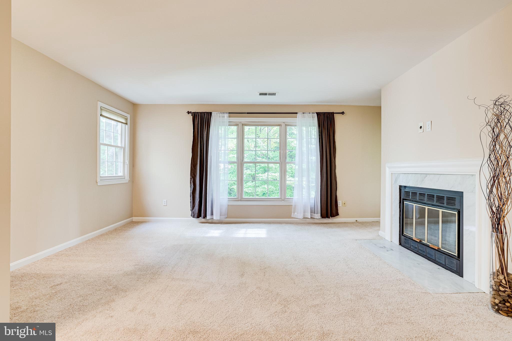 2229 Lovedale Lane, Unit G Reston, VA 20191 - Photo 5 of 38 an empty room with windows