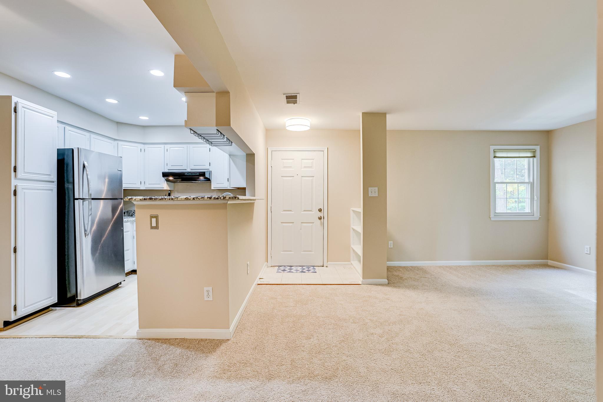 2229 Lovedale Lane, Unit G Reston, VA 20191 - Photo 9 of 38 a view of kitchen with refrigerator and microwave