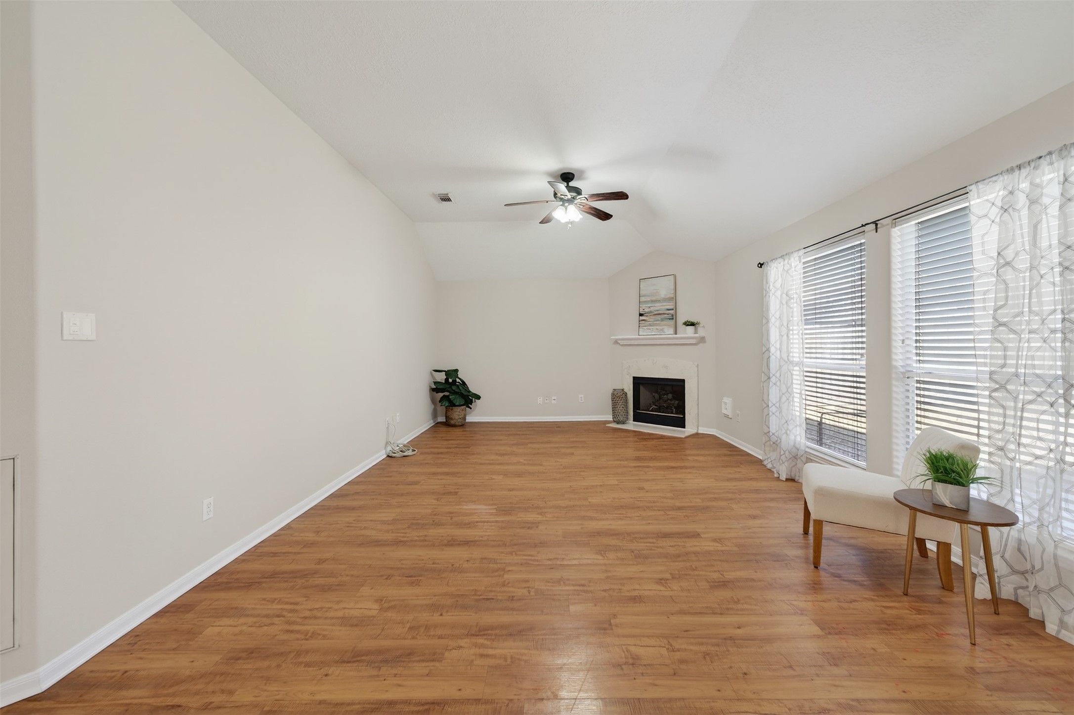 31302 Perlican Drive Spring, TX 77386 - Photo 7 of 22 Living room is spacious and offers a cozy fireplace.