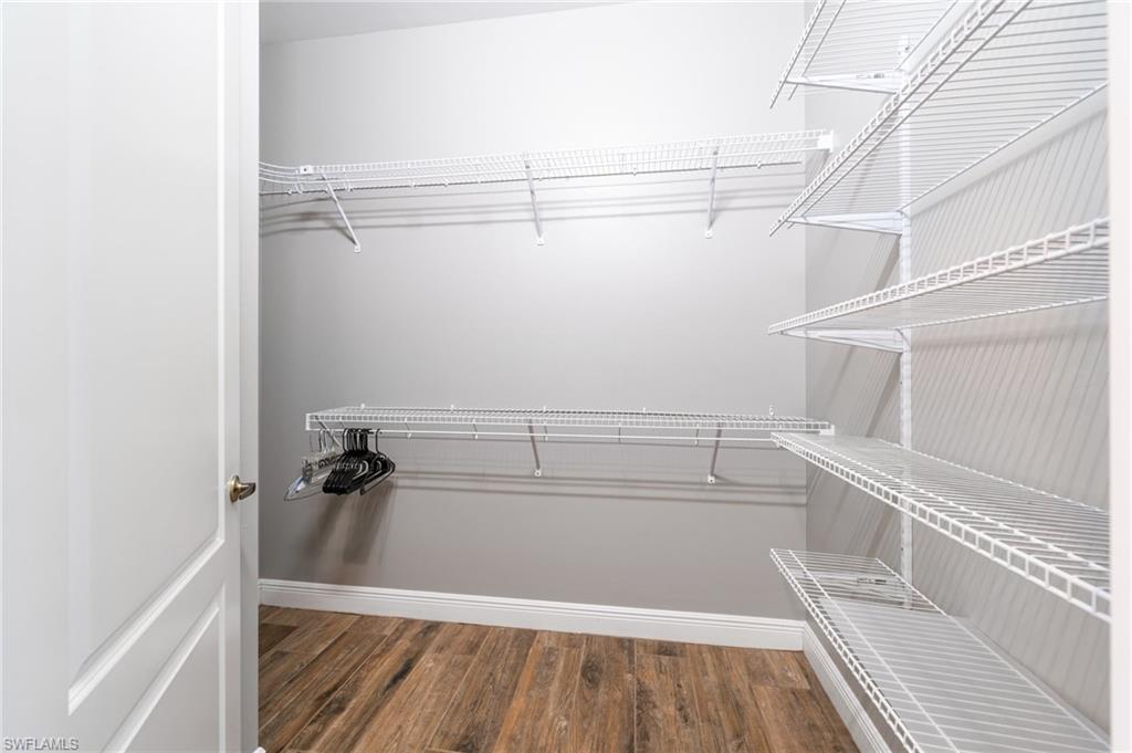 11000 Carrara Court, Unit 102 Bonita Springs, FL 34135 - Photo 15 of 31 a view of walk in closet
