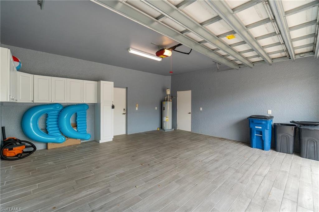 11000 Carrara Court, Unit 102 Bonita Springs, FL 34135 - Photo 25 of 31 a view of a livingroom with furniture