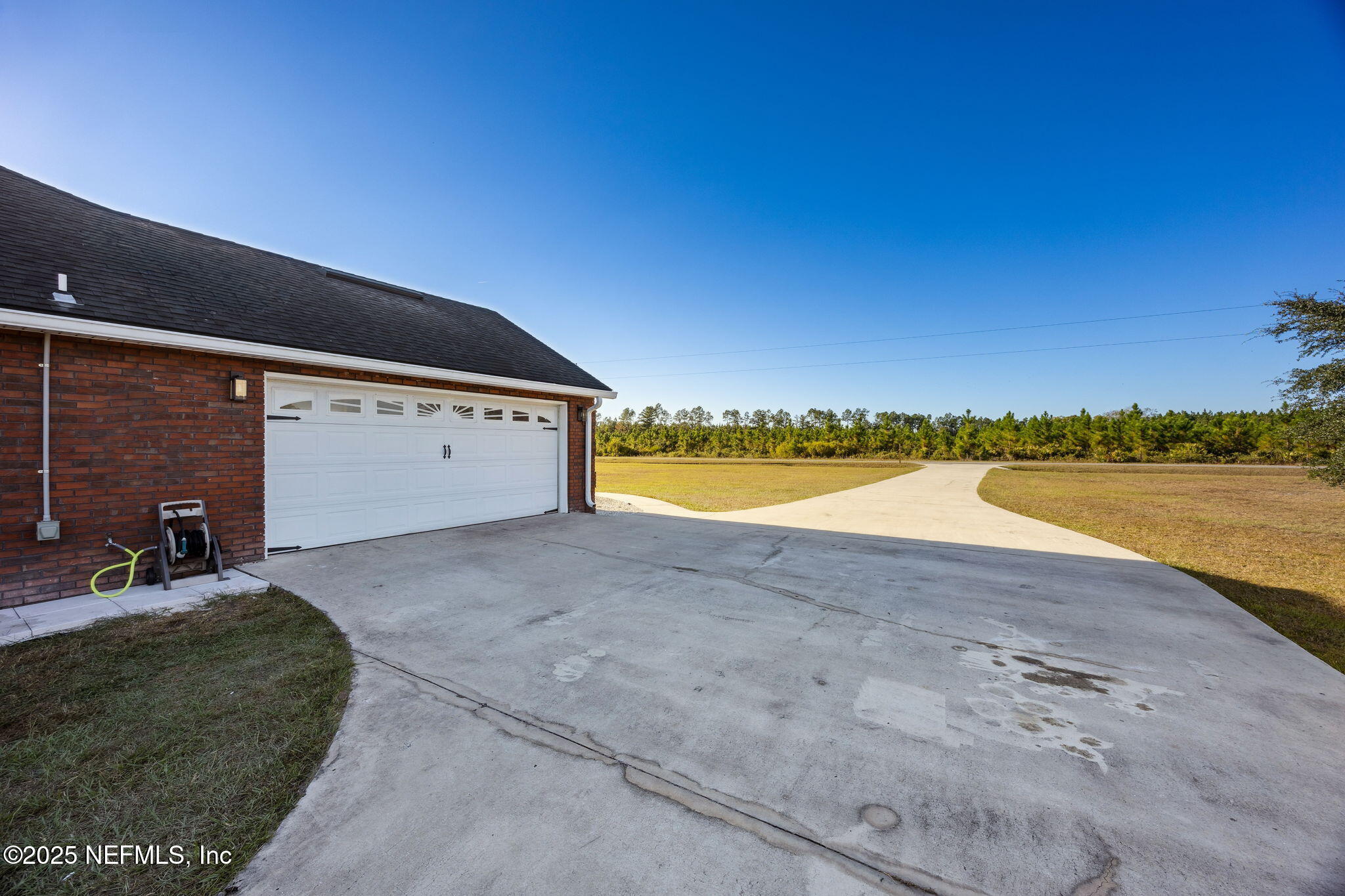 171397 Andrews Road Hilliard, FL 32046 - Photo 29 of 32 Side Entry Garage Entrance
