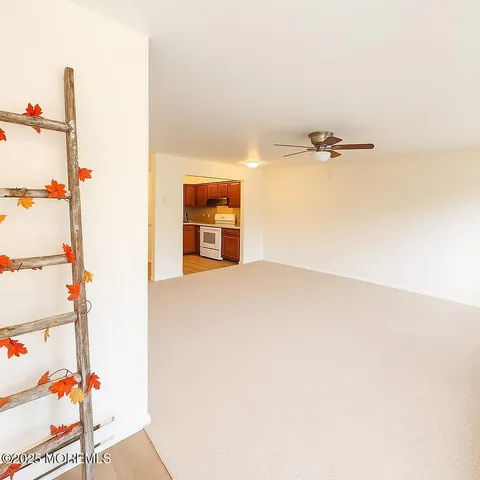 a view of a room with rack on the wall