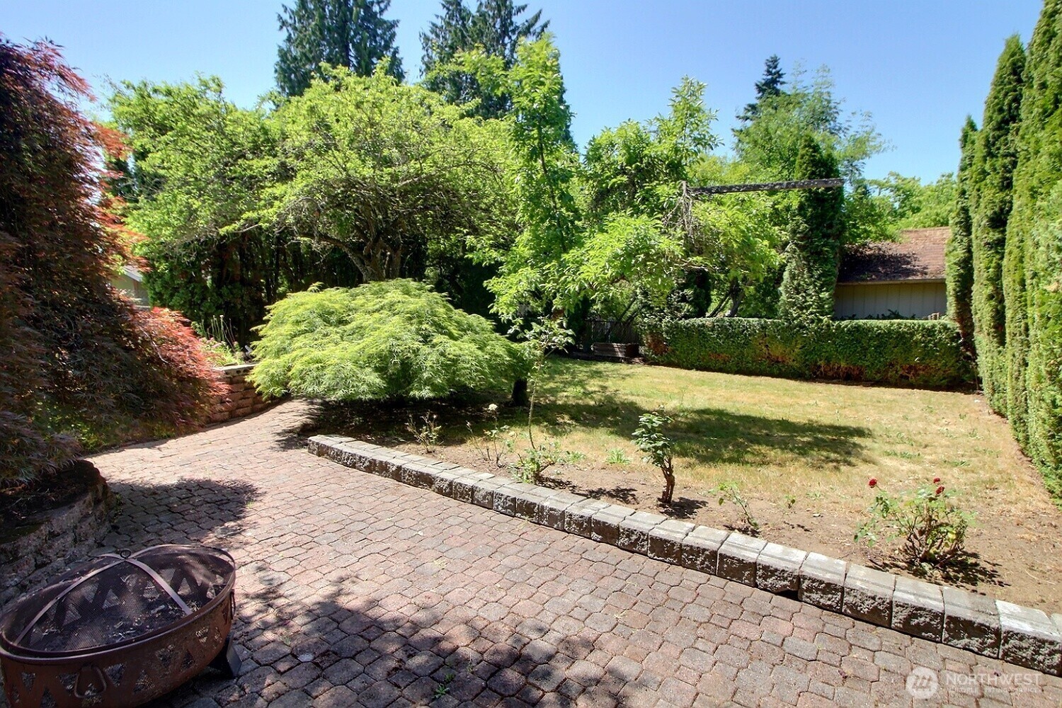 2309 Northeast 9th Place Renton, WA 98056 - Photo 36 of 38 a view of a backyard of the house