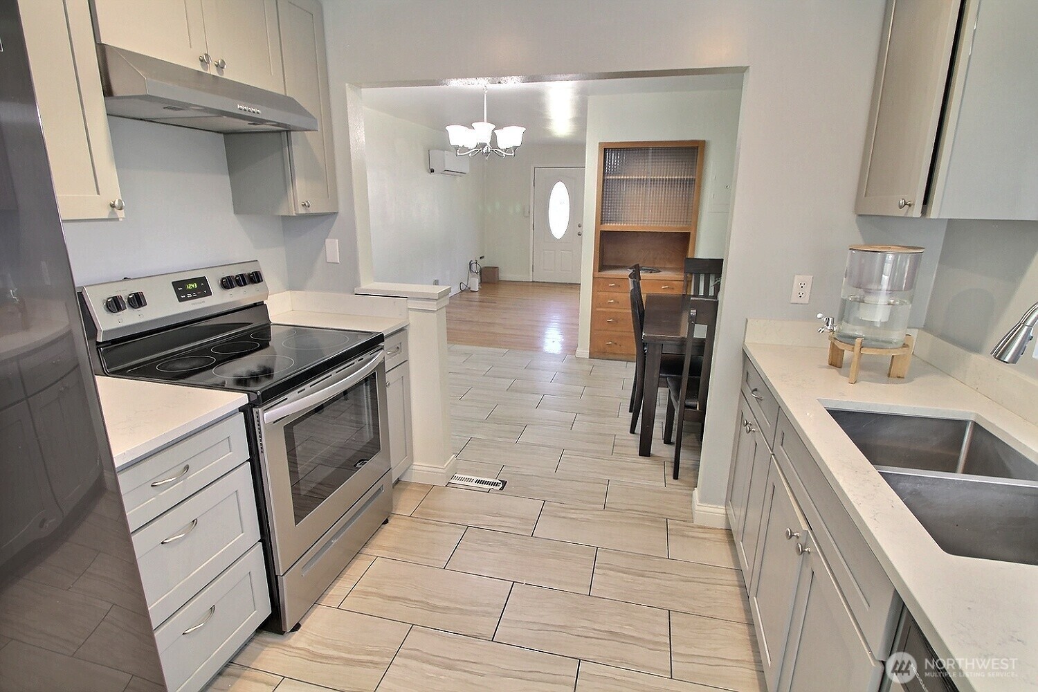 2309 Northeast 9th Place Renton, WA 98056 - Photo 4 of 38 a kitchen with a sink and cabinets