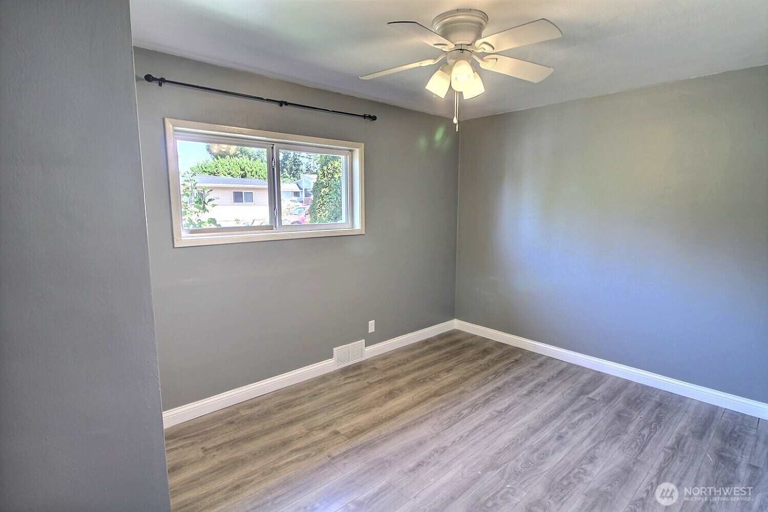 2309 Northeast 9th Place Renton, WA 98056 - Photo 9 of 38 a view of room with window and ceiling fan