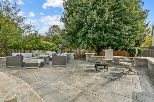 a view of a lounge chairs in the patio