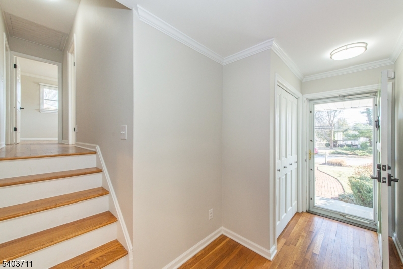 8 Abby Road Morristown, NJ 07960 - Photo 2 of 27 a view of a room with wooden floor and windows