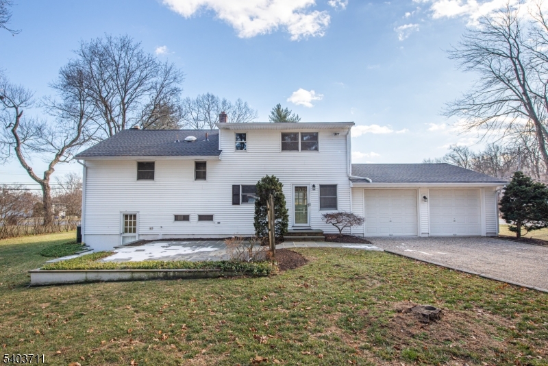 8 Abby Road Morristown, NJ 07960 - Photo 24 of 27 a view of a house with pool and a yard