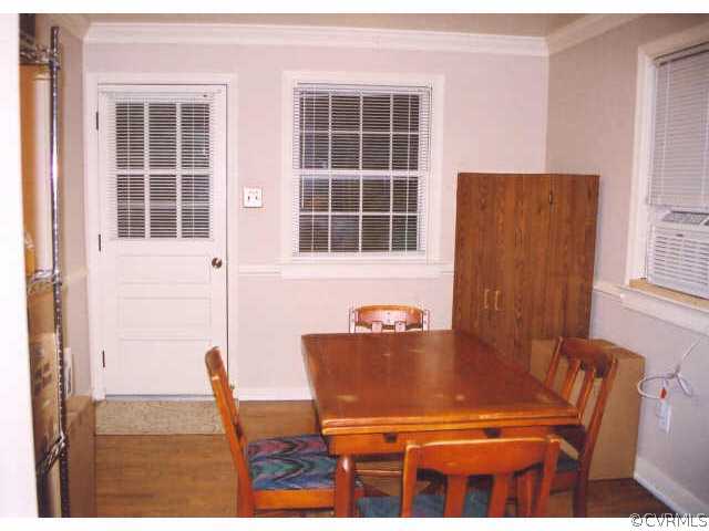7111 Shawnee Road Richmond, VA 23225 - Photo 5 of 10 a view of a dining room with furniture and windows