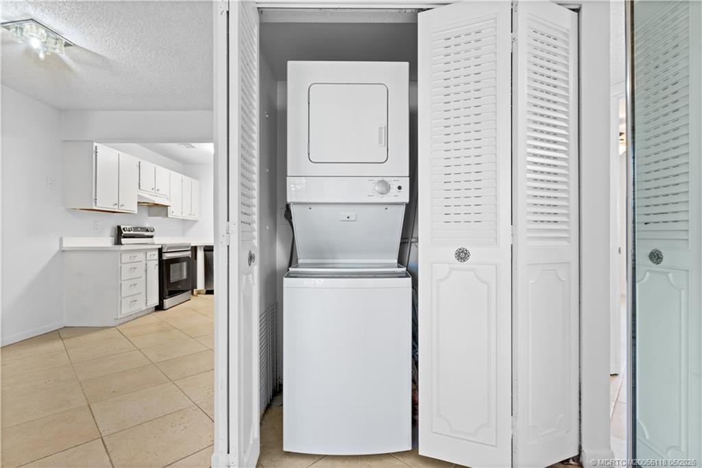 2118 Southeast Edler Drive, Unit B Stuart, FL 34994 - Photo 10 of 20 a view of a kitchen with a refrigerator