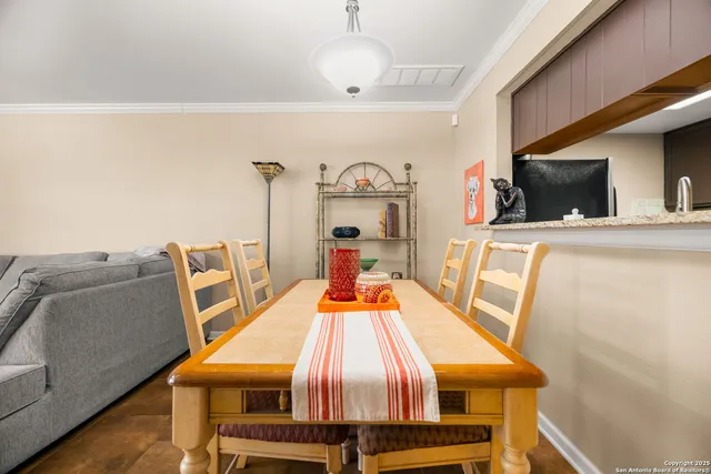 a view of a livingroom with furniture and a fireplace