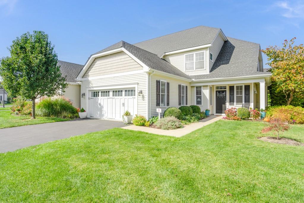 26 Yesterday Drive Cold Spring, NY 10516 - Photo 1 of 1 View of front of property featuring a front lawn and a garage