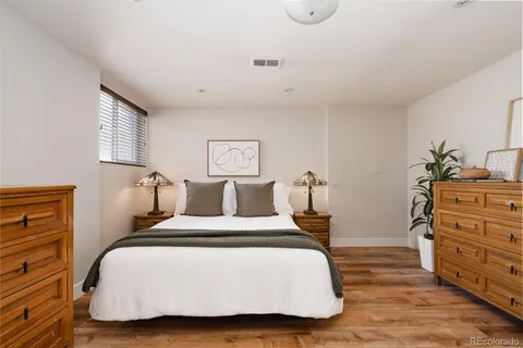 a bedroom with a bed and closet