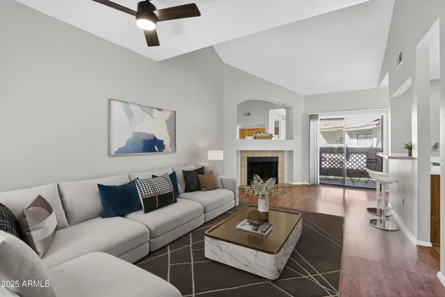 a bedroom with bed and a potted plant