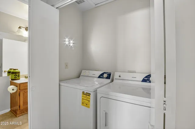 a view of a room with wooden floor and window