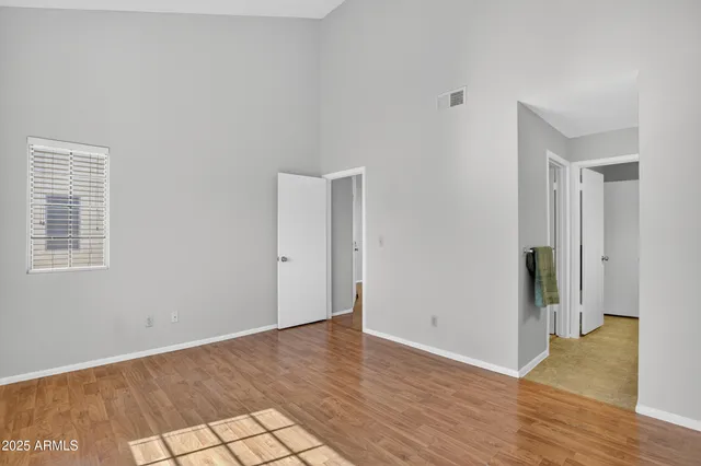 a bathroom with a sink vanity and a mirror