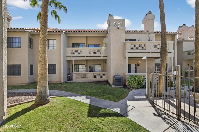 a view of a house with swimming pool