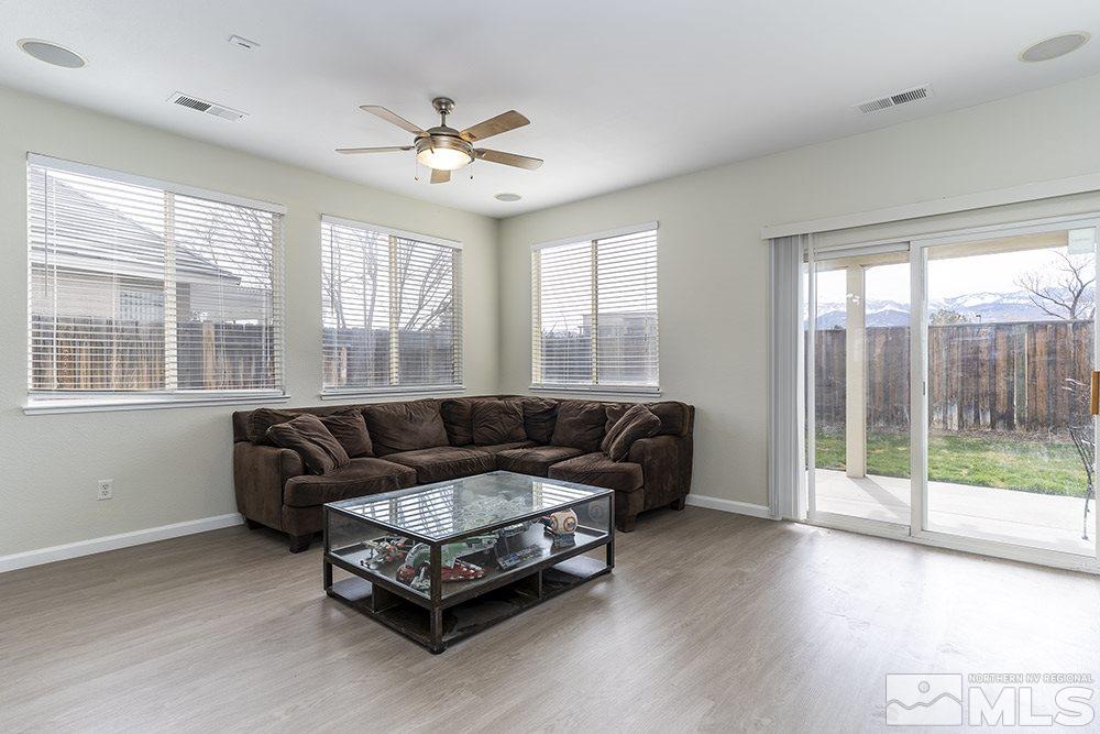 10681 Vista Bella Lane Reno, NV 89521 - Photo 5 of 17 a living room with furniture and a large window