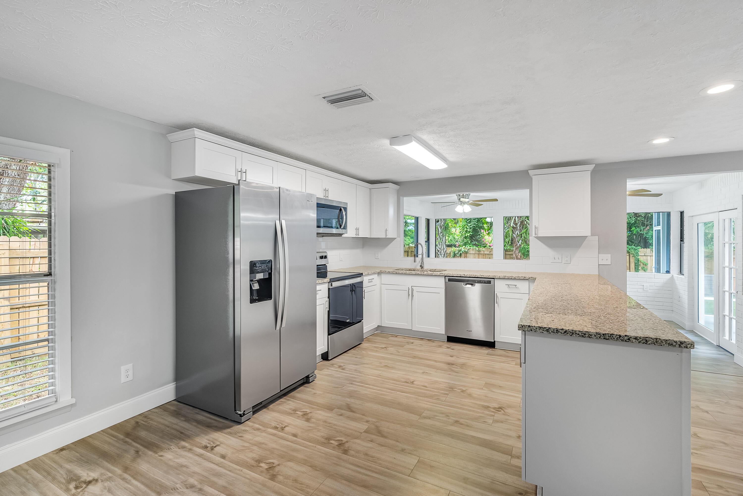 7202 Arthurs Road Fort Pierce, FL 34951 - Photo 14 of 35 Classic White cabinetry w/ SS Appliances