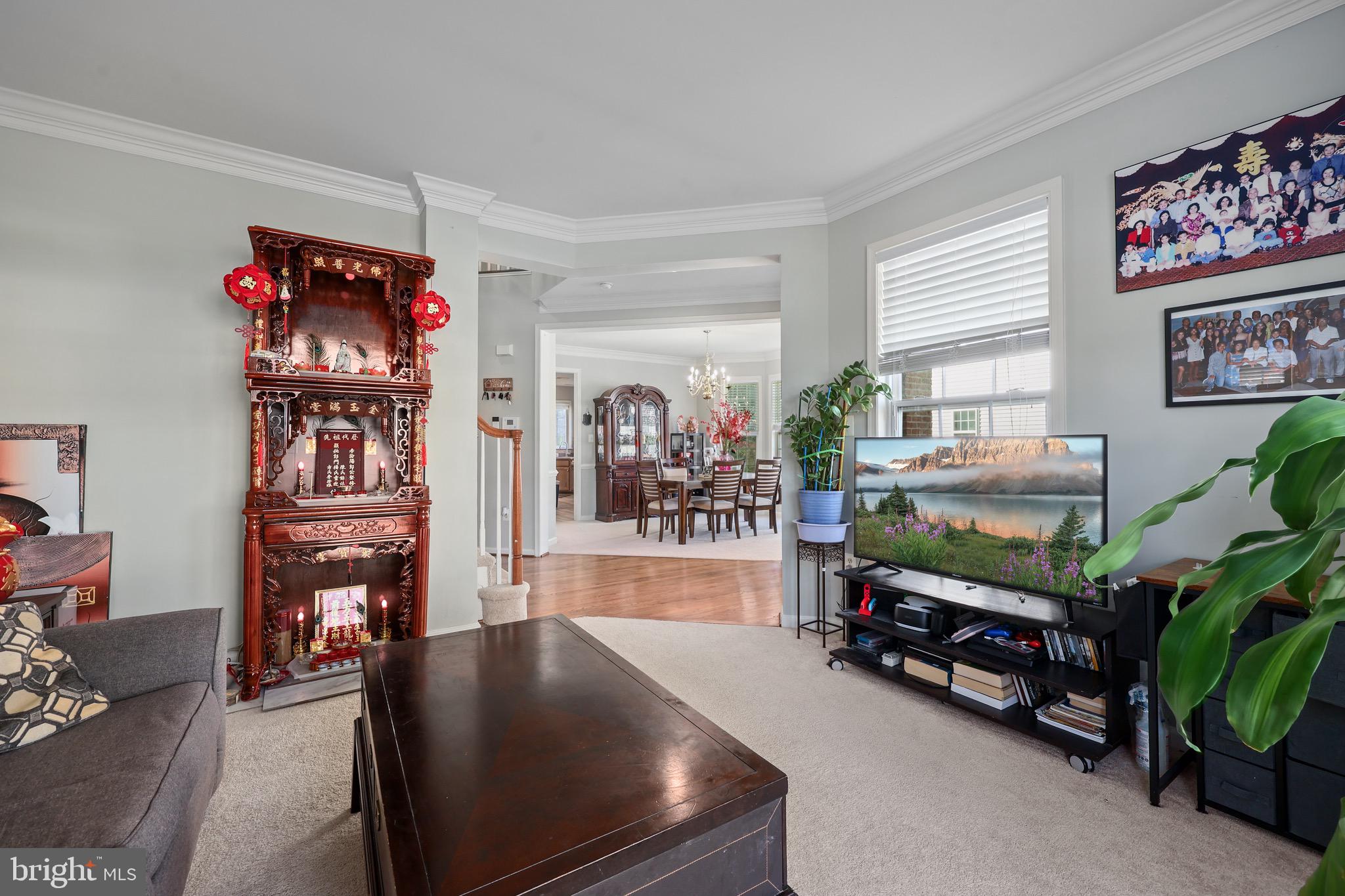 3671 Expedition Drive Triangle, VA 22172 - Photo 15 of 55 a living room with furniture and a flat screen tv