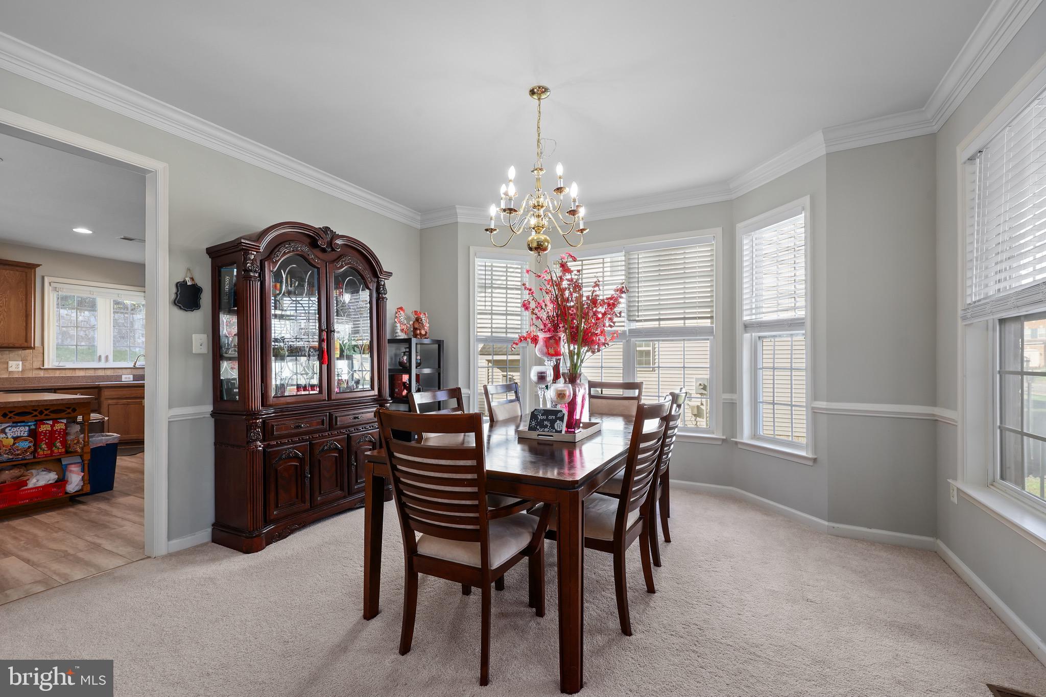3671 Expedition Drive Triangle, VA 22172 - Photo 16 of 55 a dining room with furniture and window