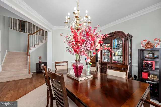a kitchen with stainless steel appliances granite countertop lots of counter top space and furniture