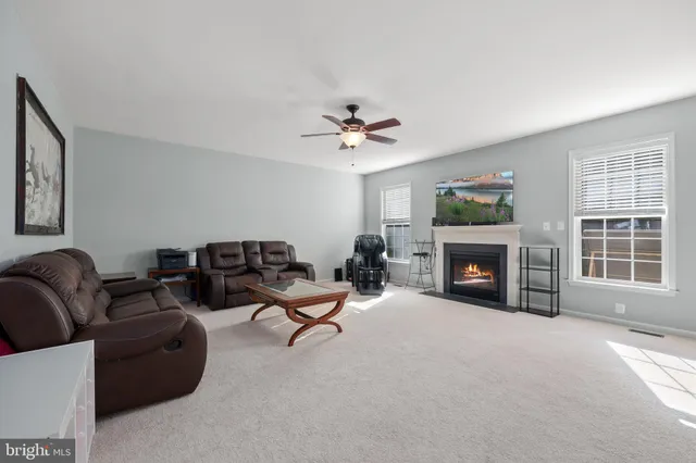 a bathroom with a sink a mirror and a toilet