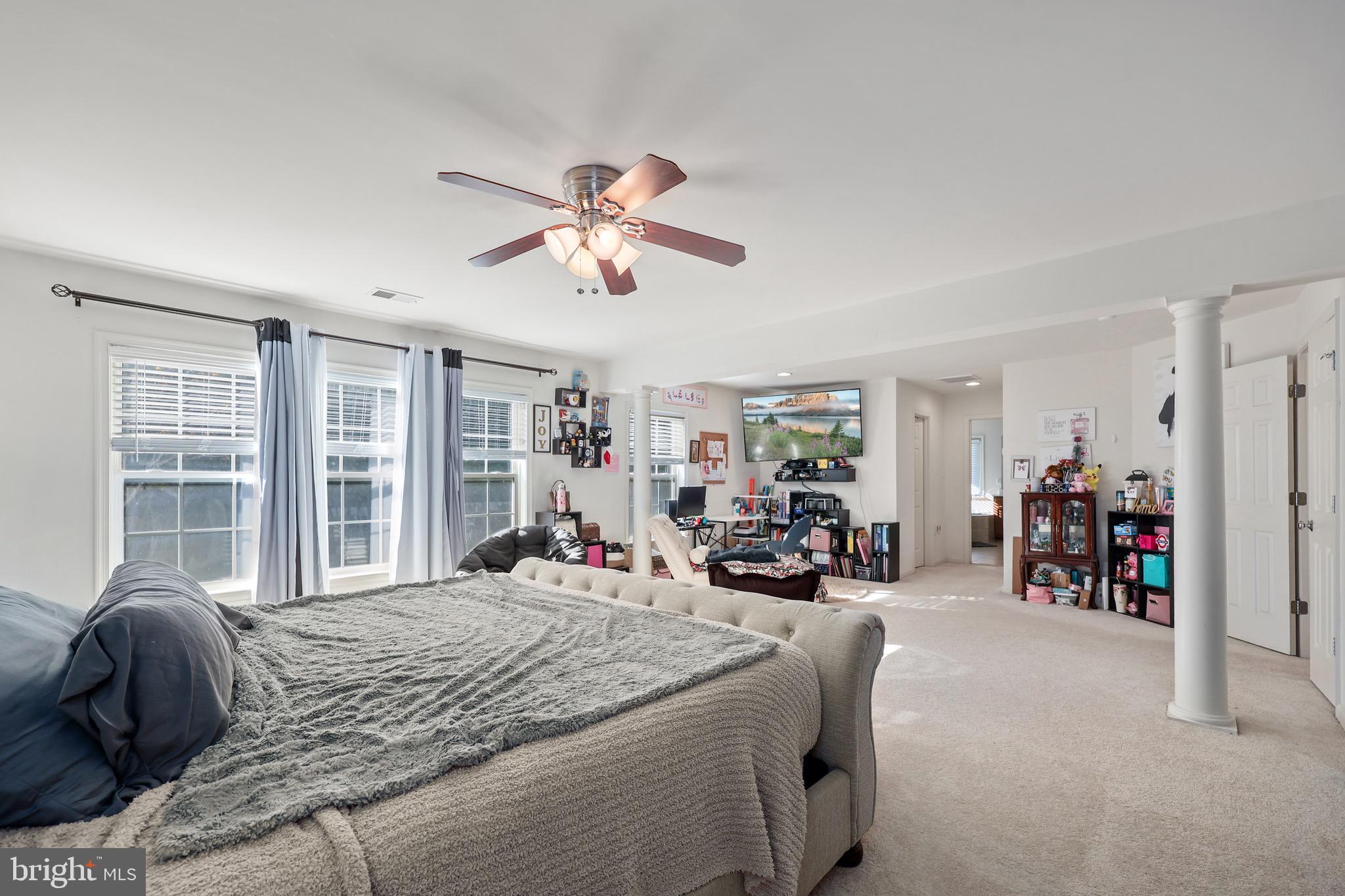 3671 Expedition Drive Triangle, VA 22172 - Photo 30 of 55 a bed room with a bed and a large window