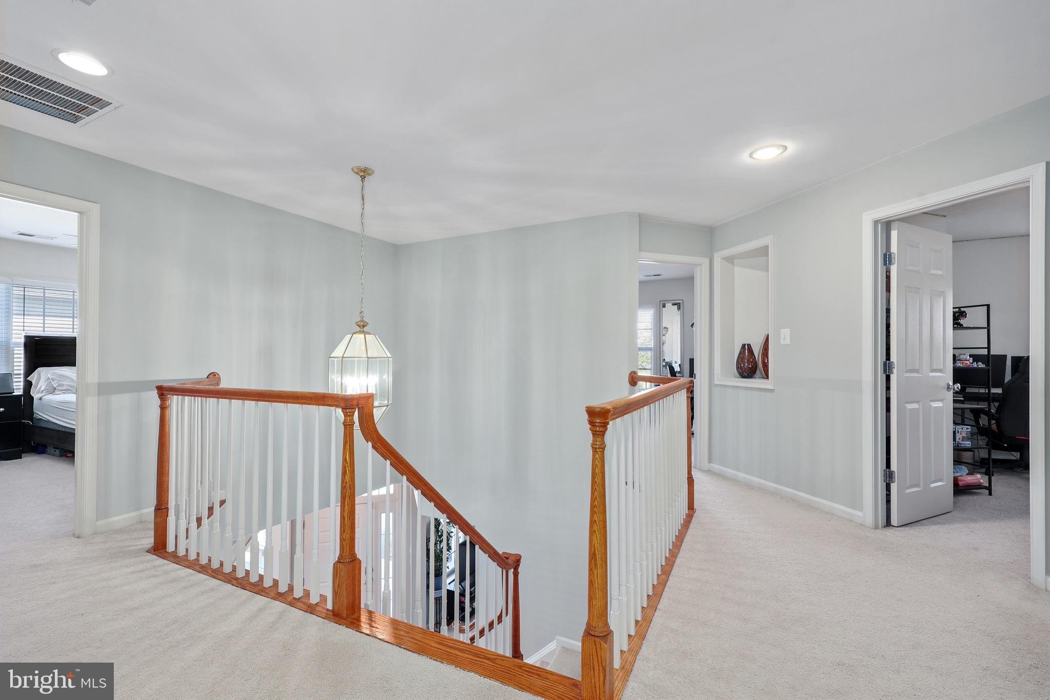 3671 Expedition Drive Triangle, VA 22172 - Photo 35 of 55 a view of a hallway with workspace