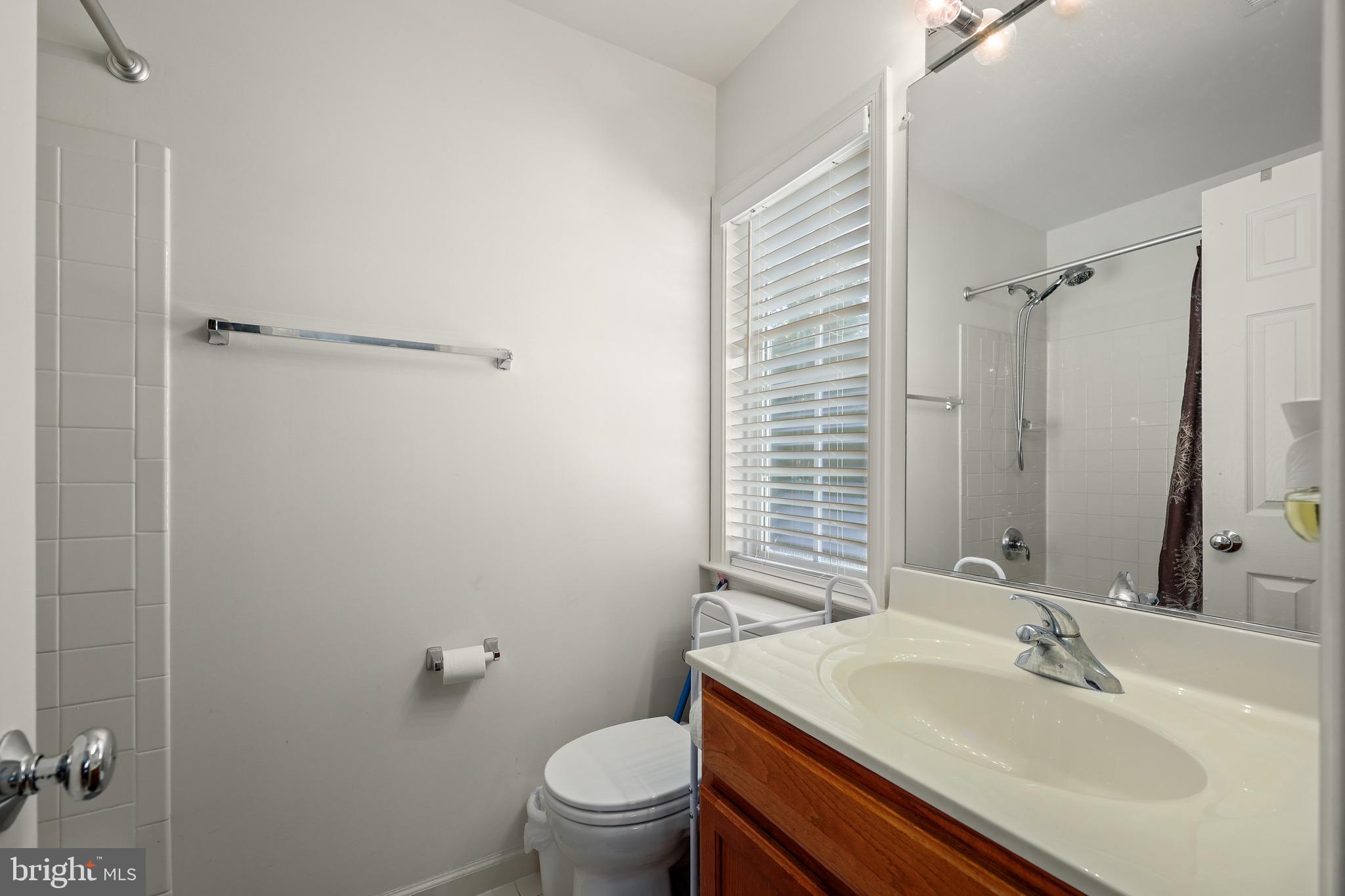 3671 Expedition Drive Triangle, VA 22172 - Photo 37 of 55 a bathroom with a sink toilet and shower