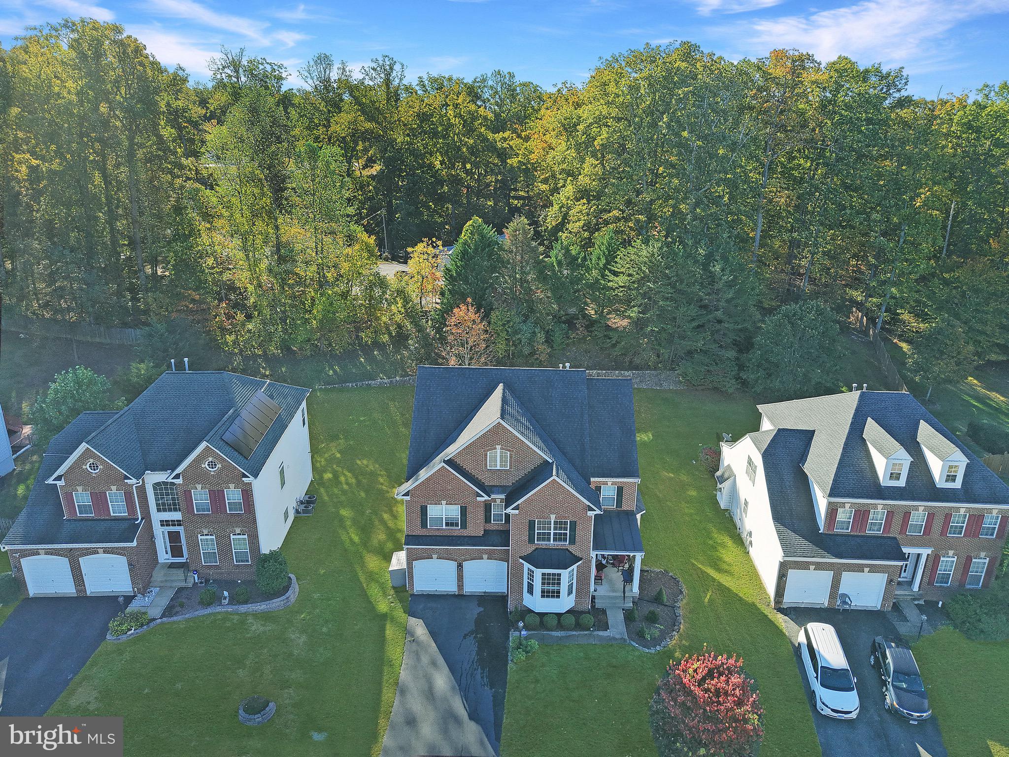 3671 Expedition Drive Triangle, VA 22172 - Photo 51 of 55 a front view of a house with garden