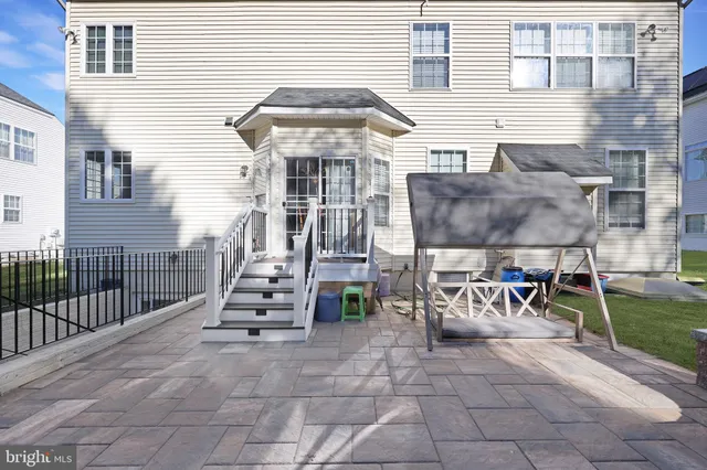 front view of a house with a garden