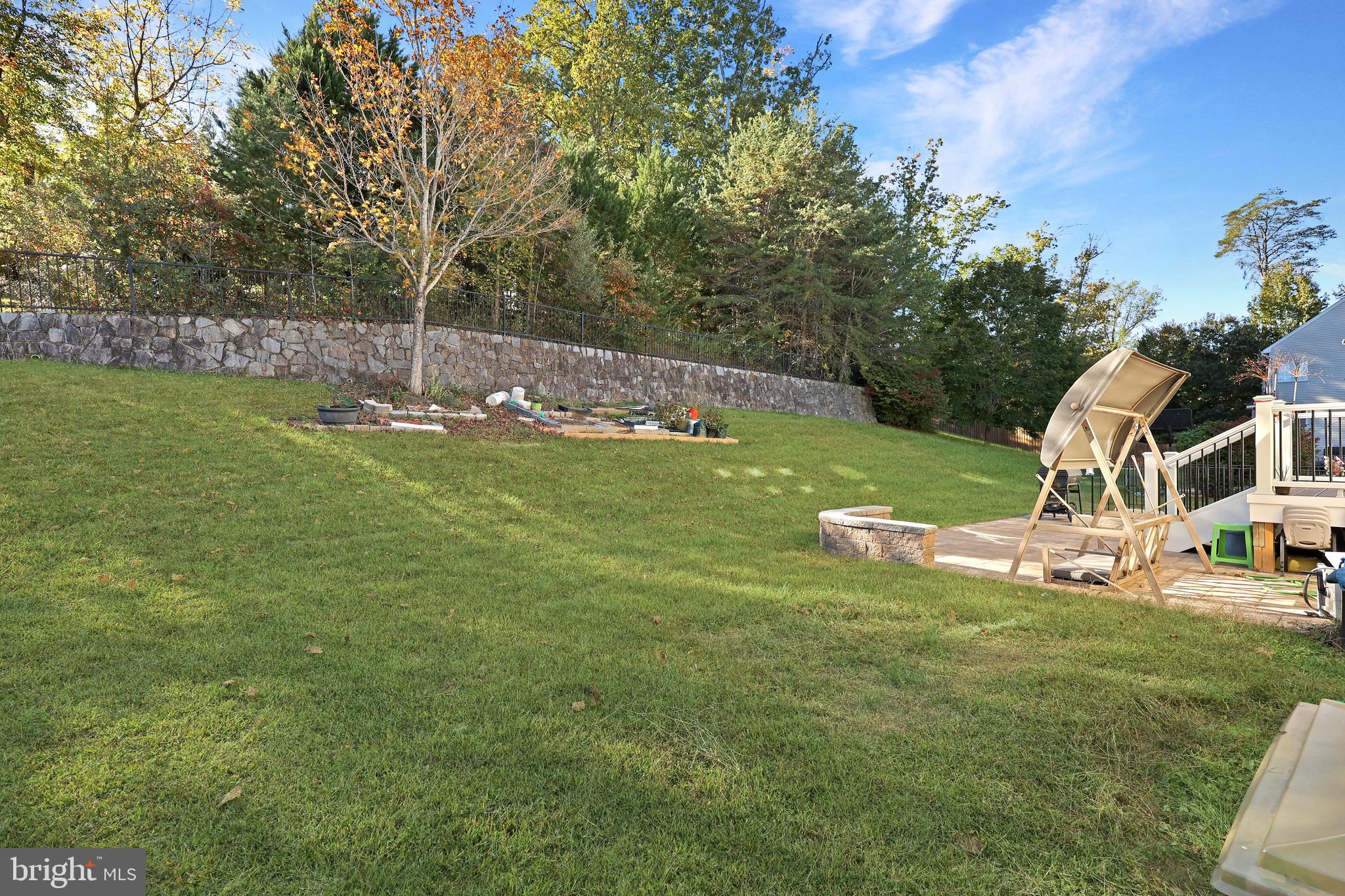 3671 Expedition Drive Triangle, VA 22172 - Photo 9 of 55 a view of a house with a backyard