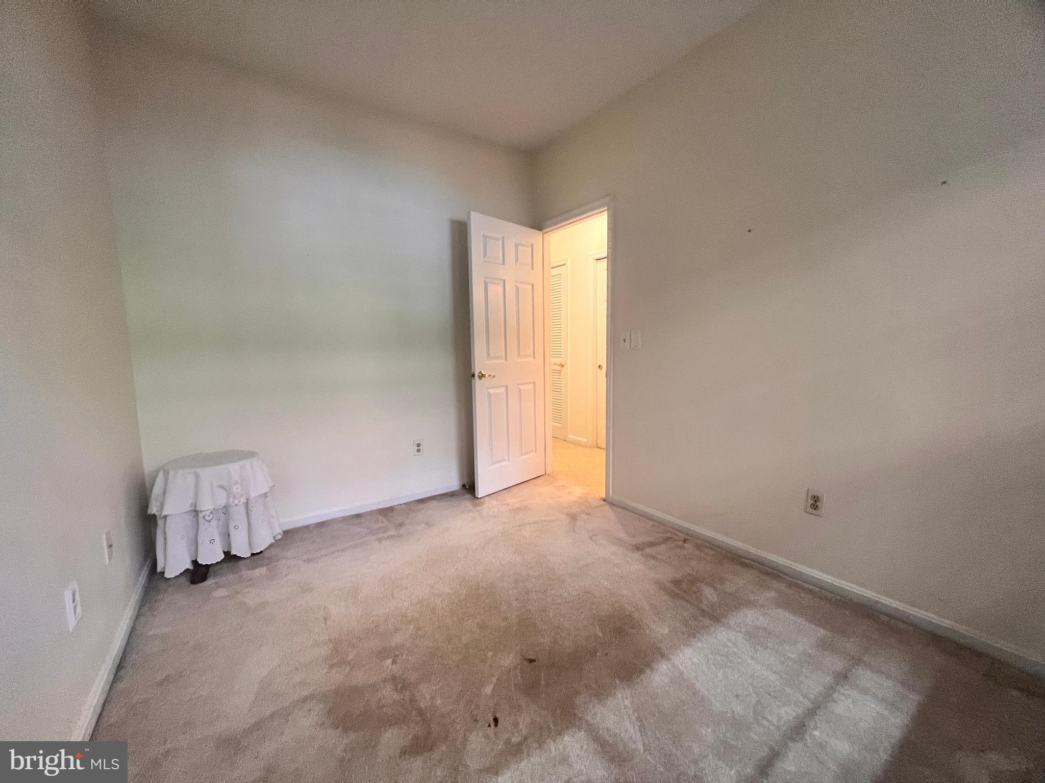 103 Square Rigger Way, Unit 103 Solomons, MD 20688 - Photo 19 of 21 a view of an empty room and a window