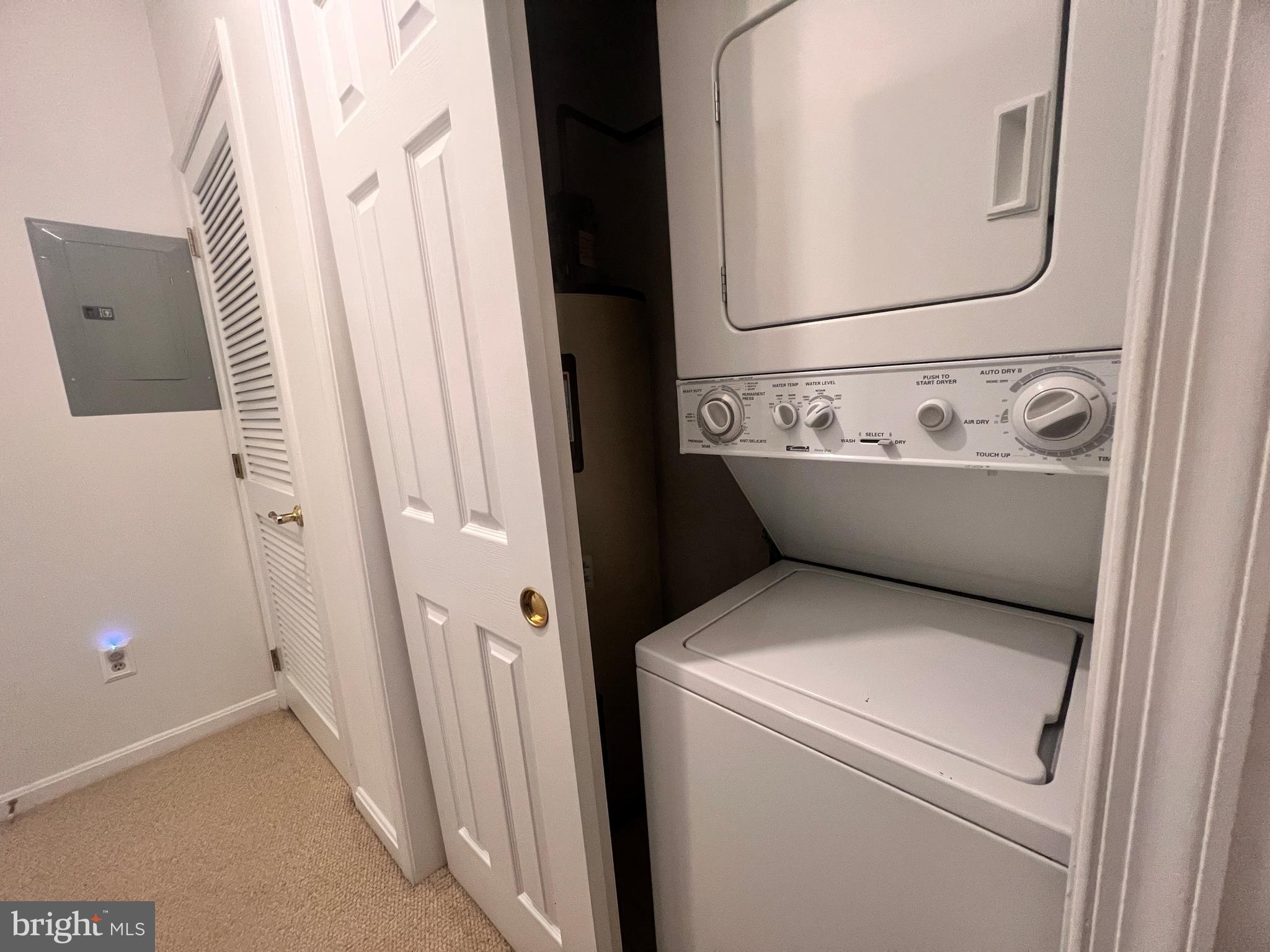 103 Square Rigger Way, Unit 103 Solomons, MD 20688 - Photo 21 of 21 a view of washer and dryer