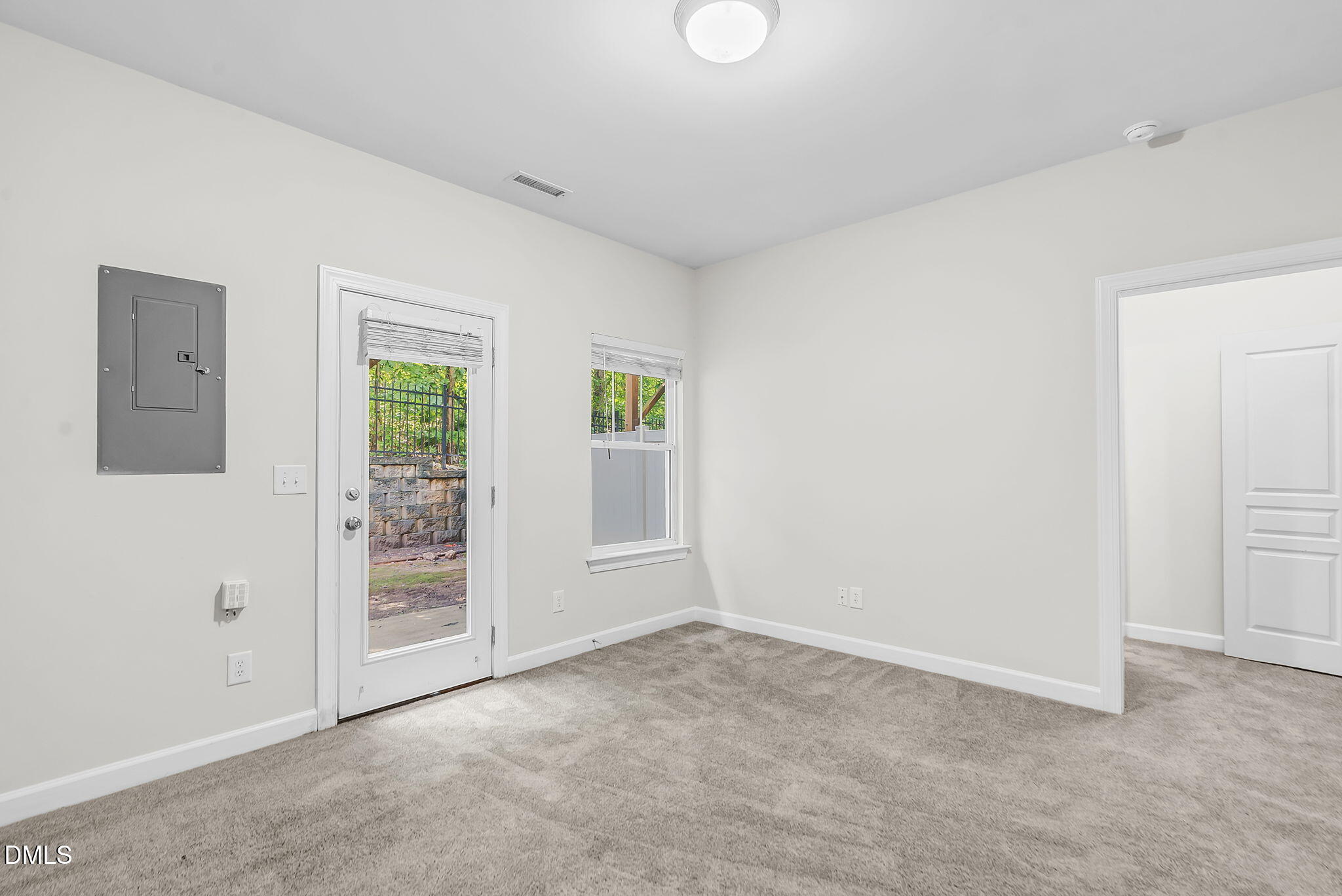 8032 Sycamore Hill Lane Raleigh, NC 27612 - Photo 11 of 59 an empty room with windows
