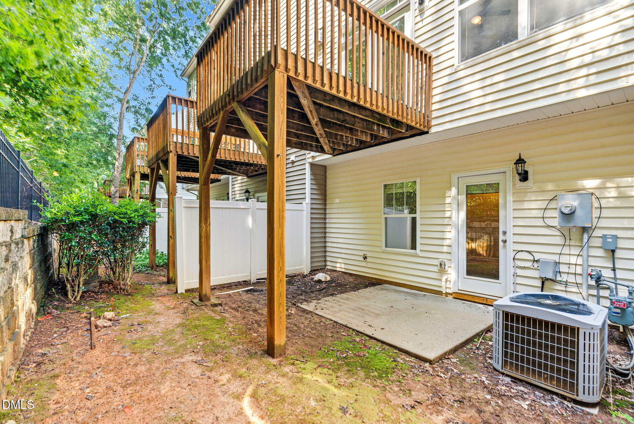 8032 Sycamore Hill Lane Raleigh, NC 27612 - Photo 16 of 59 a front view of a house with garden