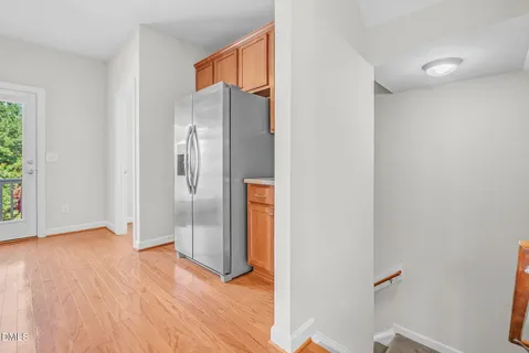 a kitchen with stainless steel appliances granite countertop a sink stove and microwave