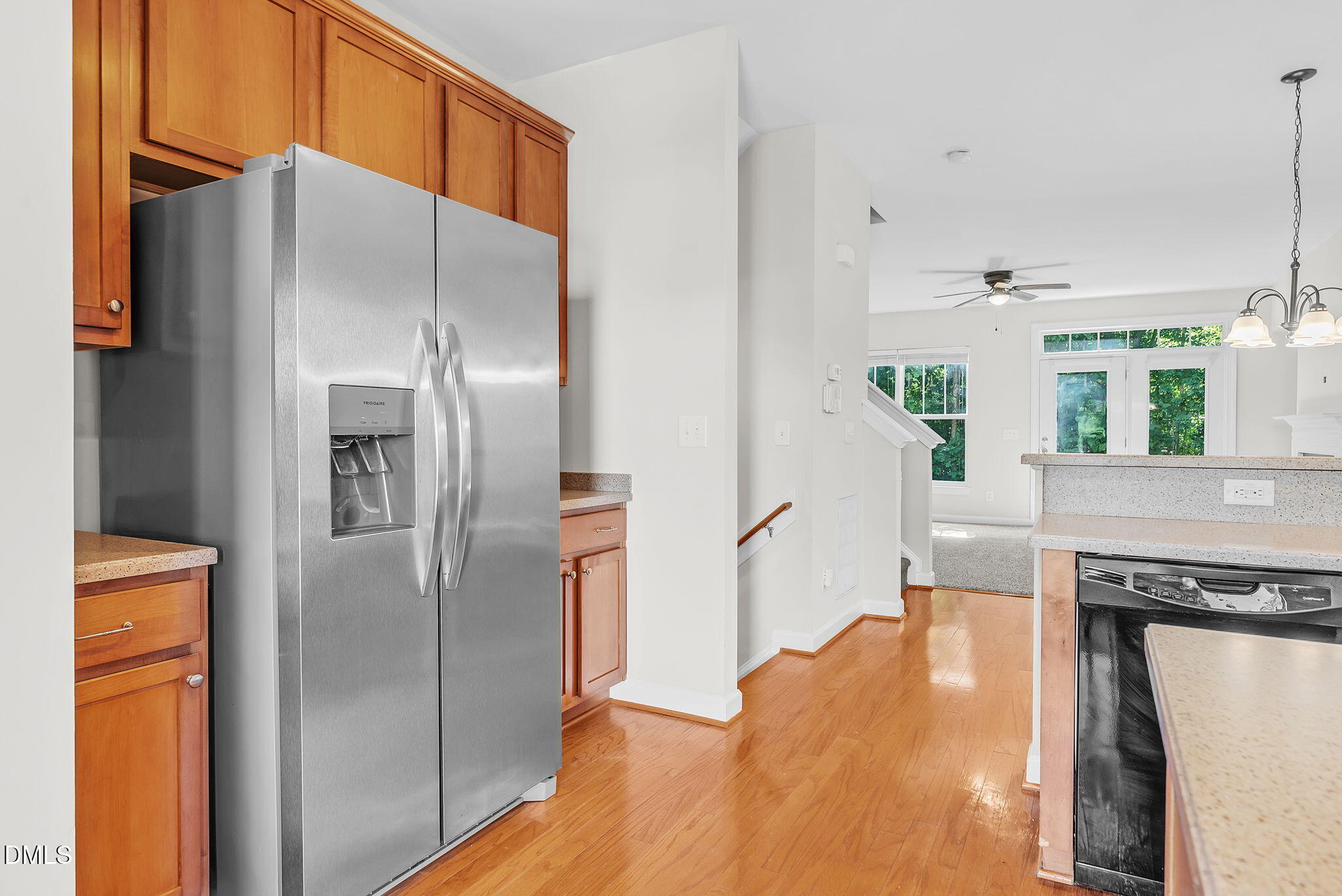 8032 Sycamore Hill Lane Raleigh, NC 27612 - Photo 27 of 59 a kitchen with stainless steel appliances a refrigerator and a stove